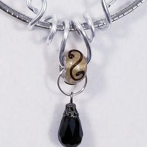 Aluminum Silver Spiral Pendant Tan Black Bead